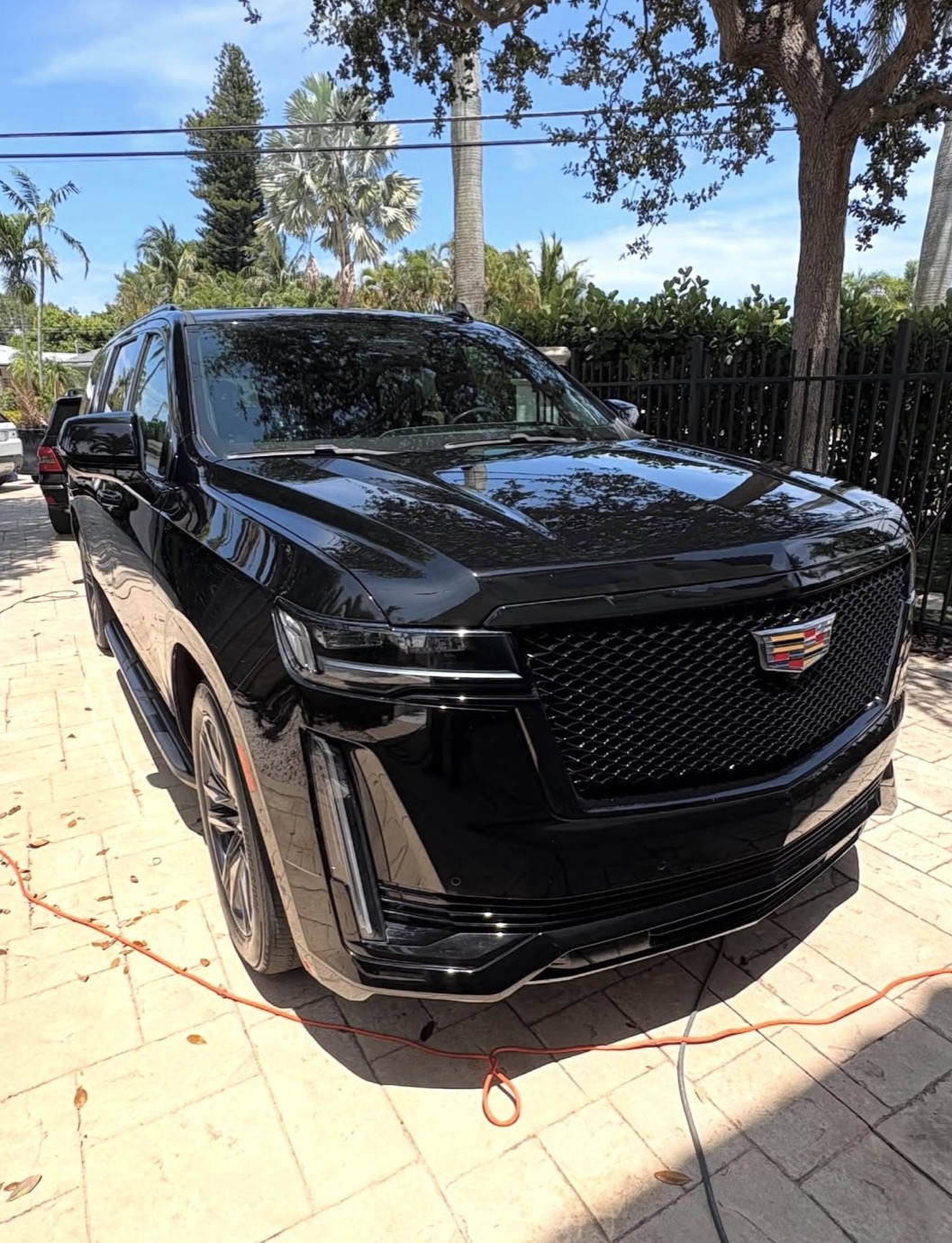 Black Cadillac Escalade after a full detail and coating